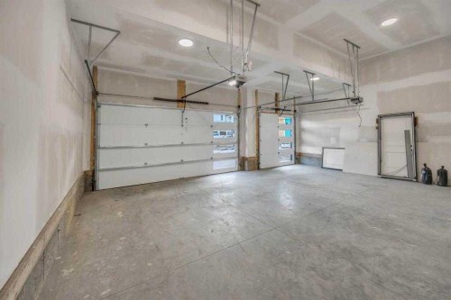 384 Watercrest Place, Chestermere, AB - Indoor Photo Showing Garage