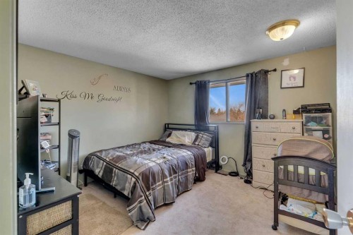 354 Aboyne Place Ne, Calgary, AB - Indoor Photo Showing Bedroom
