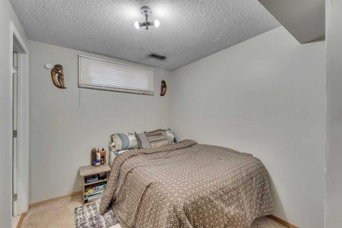 354 Aboyne Place Ne, Calgary, AB - Indoor Photo Showing Bedroom