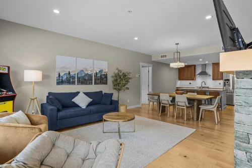 200-707 Spring Creek Drive, Canmore, AB - Indoor Photo Showing Living Room