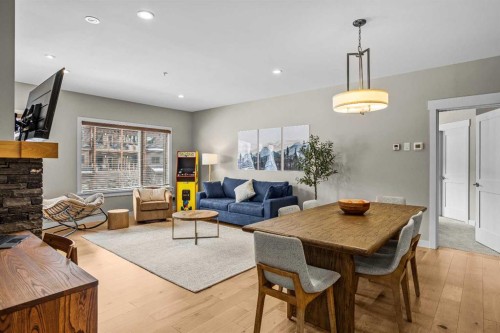 200-707 Spring Creek Drive, Canmore, AB - Indoor Photo Showing Living Room