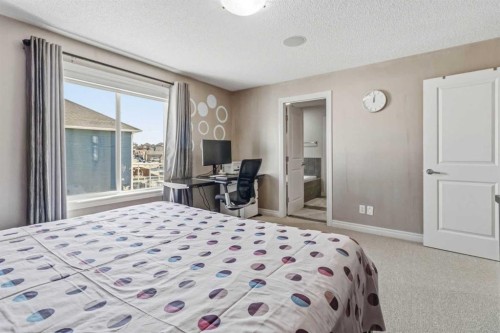 19 Saddleland Drive, Calgary, AB - Indoor Photo Showing Bedroom