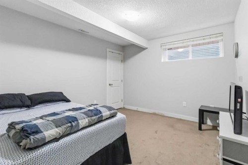 19 Saddleland Drive, Calgary, AB - Indoor Photo Showing Bedroom