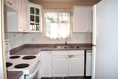 6348 Bowmont Crescent Nw, Calgary, AB - Indoor Photo Showing Kitchen With Double Sink