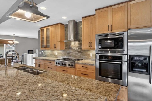 31 Rosetree Road Nw, Calgary, AB - Indoor Photo Showing Kitchen With Stainless Steel Kitchen With Double Sink With Upgraded Kitchen