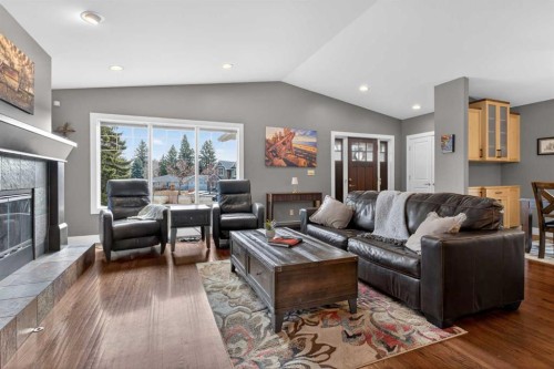 31 Rosetree Road Nw, Calgary, AB - Indoor Photo Showing Living Room With Fireplace