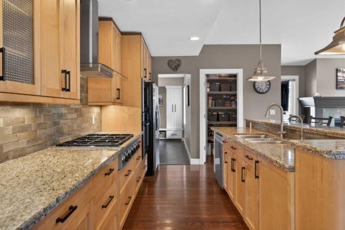 31 Rosetree Road Nw, Calgary, AB - Indoor Photo Showing Kitchen With Double Sink With Upgraded Kitchen