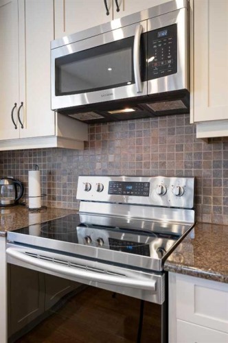 203 Cambridge Bay, Strathmore, AB - Indoor Photo Showing Kitchen With Upgraded Kitchen