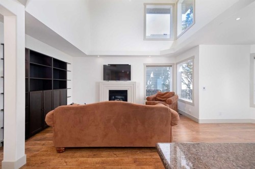 203 Cambridge Bay, Strathmore, AB - Indoor Photo Showing Living Room With Fireplace