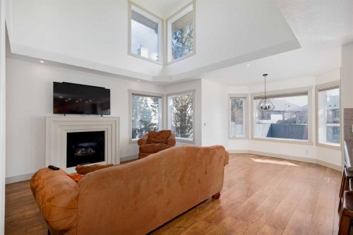 203 Cambridge Bay, Strathmore, AB - Indoor Photo Showing Living Room With Fireplace