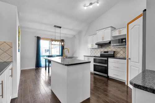 132 West Creek Drive, Chestermere, AB - Indoor Photo Showing Kitchen With Upgraded Kitchen