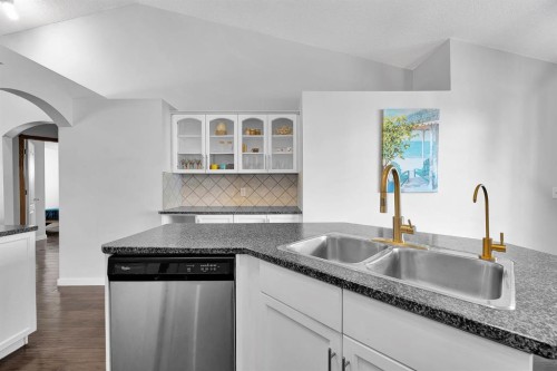 132 West Creek Drive, Chestermere, AB - Indoor Photo Showing Kitchen With Double Sink