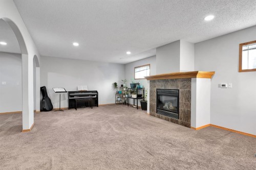 132 West Creek Drive, Chestermere, AB - Indoor With Fireplace