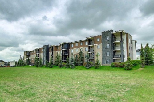 301-355 Taralake Way Ne, Calgary, AB - Outdoor With Balcony With Facade