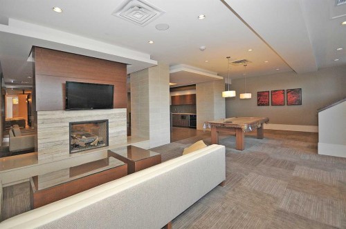 231-222 Riverfront Avenue Sw, Calgary, AB - Indoor With Fireplace