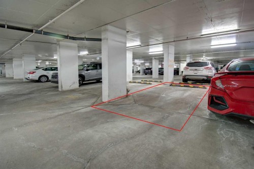 231-222 Riverfront Avenue Sw, Calgary, AB - Indoor Photo Showing Garage