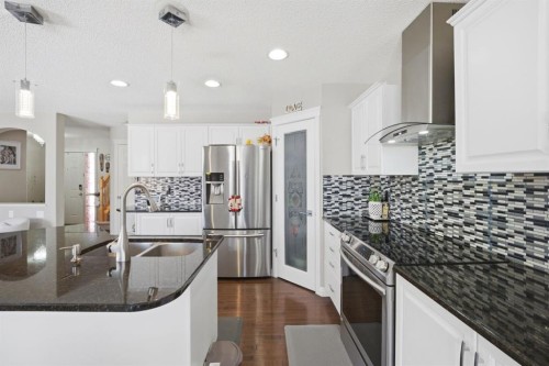 87 Kincora Drive Nw, Calgary, AB - Indoor Photo Showing Kitchen With Double Sink With Upgraded Kitchen