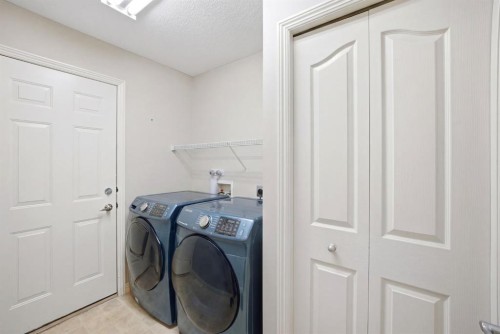 87 Kincora Drive Nw, Calgary, AB - Indoor Photo Showing Laundry Room