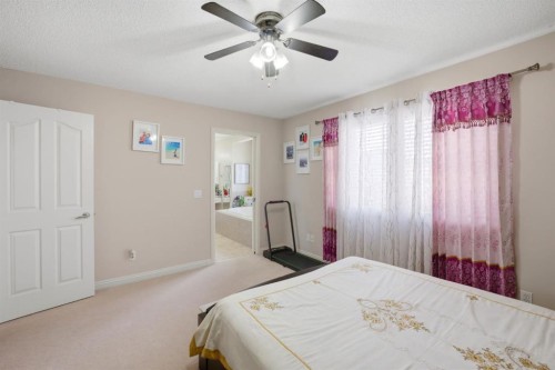 87 Kincora Drive Nw, Calgary, AB - Indoor Photo Showing Bedroom