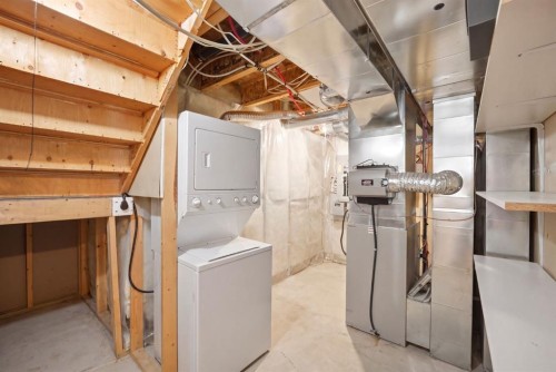 87 Kincora Drive Nw, Calgary, AB - Indoor Photo Showing Laundry Room