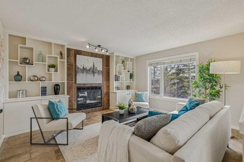 286 Mountain Park Drive Se, Calgary, AB - Indoor Photo Showing Living Room With Fireplace