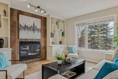 286 Mountain Park Drive Se, Calgary, AB - Indoor Photo Showing Living Room With Fireplace