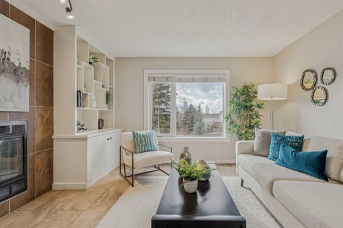 286 Mountain Park Drive Se, Calgary, AB - Indoor Photo Showing Living Room With Fireplace