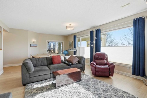 40 Eagleview Way, Cochrane, AB - Indoor Photo Showing Living Room