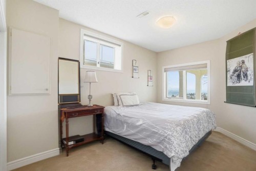 40 Eagleview Way, Cochrane, AB - Indoor Photo Showing Bedroom
