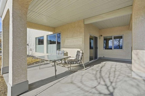 40 Eagleview Way, Cochrane, AB - Outdoor With Deck Patio Veranda With Exterior