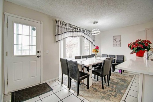 10316 Hidden Valley Drive Nw, Calgary, AB - Indoor Photo Showing Dining Room
