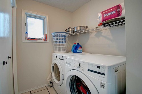 10316 Hidden Valley Drive Nw, Calgary, AB - Indoor Photo Showing Laundry Room