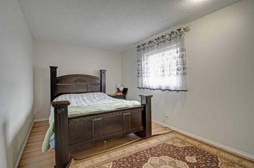 10316 Hidden Valley Drive Nw, Calgary, AB - Indoor Photo Showing Bedroom