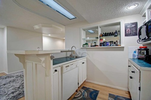 10316 Hidden Valley Drive Nw, Calgary, AB - Indoor Photo Showing Kitchen With Double Sink