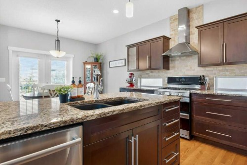 200 Kingston Way Se, Airdrie, AB - Indoor Photo Showing Kitchen With Double Sink