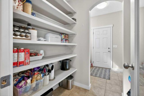 200 Kingston Way Se, Airdrie, AB - Indoor With Storage