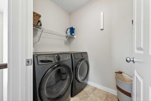 200 Kingston Way Se, Airdrie, AB - Indoor Photo Showing Laundry Room