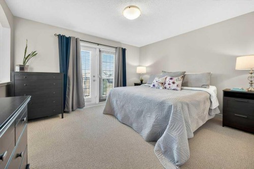 200 Kingston Way Se, Airdrie, AB - Indoor Photo Showing Bedroom