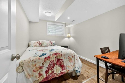 200 Kingston Way Se, Airdrie, AB - Indoor Photo Showing Bedroom