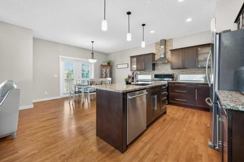 200 Kingston Way Se, Airdrie, AB - Indoor Photo Showing Kitchen With Upgraded Kitchen