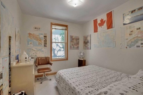 231 11A Street Ne, Calgary, AB - Indoor Photo Showing Bedroom