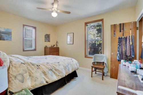 231 11A Street Ne, Calgary, AB - Indoor Photo Showing Bedroom