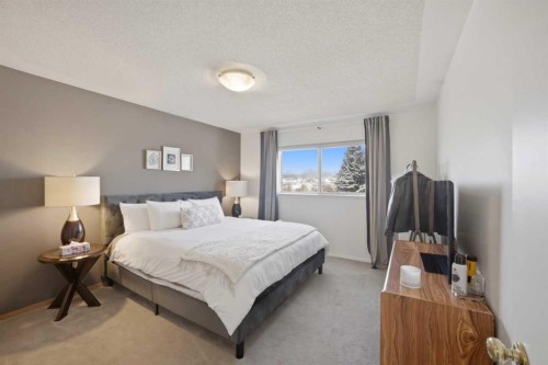 80 Martinglen Way Ne, Calgary, AB - Indoor Photo Showing Bedroom