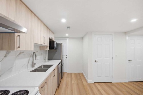 80 Martinglen Way Ne, Calgary, AB - Indoor Photo Showing Kitchen With Double Sink