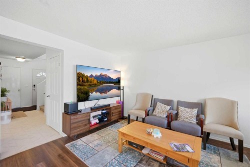 80 Martinglen Way Ne, Calgary, AB - Indoor Photo Showing Living Room