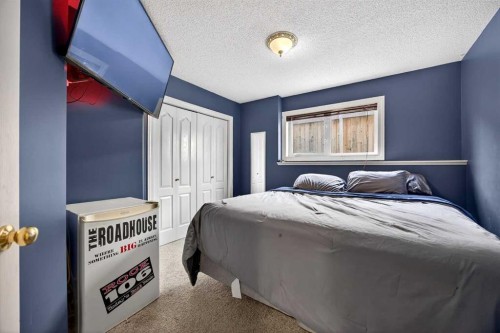1503 Thorburn Drive Se, Airdrie, AB - Indoor Photo Showing Bedroom