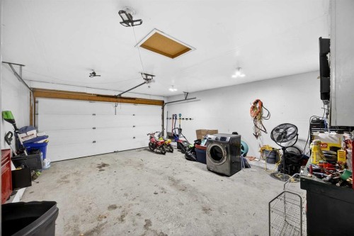 1503 Thorburn Drive Se, Airdrie, AB - Indoor Photo Showing Garage