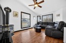 1503 Thorburn Drive Se, Airdrie, AB  - Indoor Photo Showing Living Room 