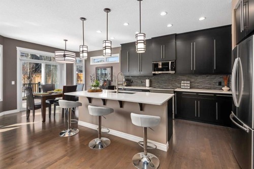 323 Nolan Hill Boulevard Nw, Calgary, AB - Indoor Photo Showing Kitchen With Upgraded Kitchen