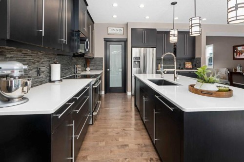 323 Nolan Hill Boulevard Nw, Calgary, AB - Indoor Photo Showing Kitchen With Upgraded Kitchen